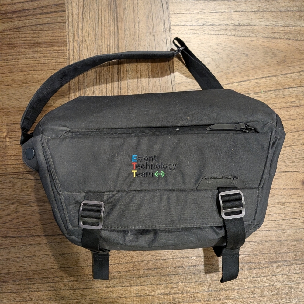 Stylish Black Belt Bag with Embroidered Design